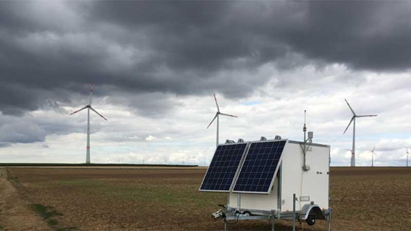 Lidar with windfarm in the background