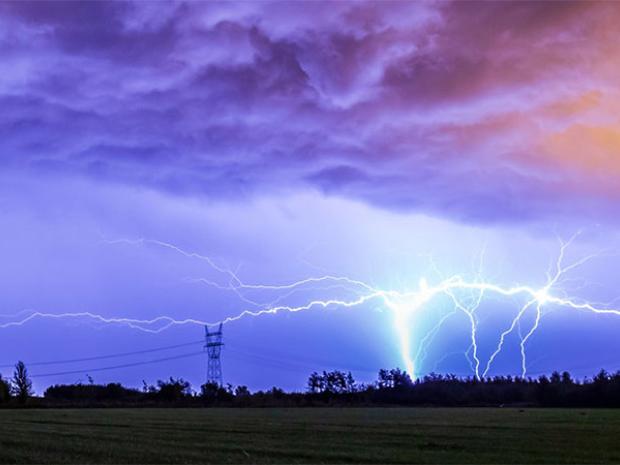 Lightning over power lines