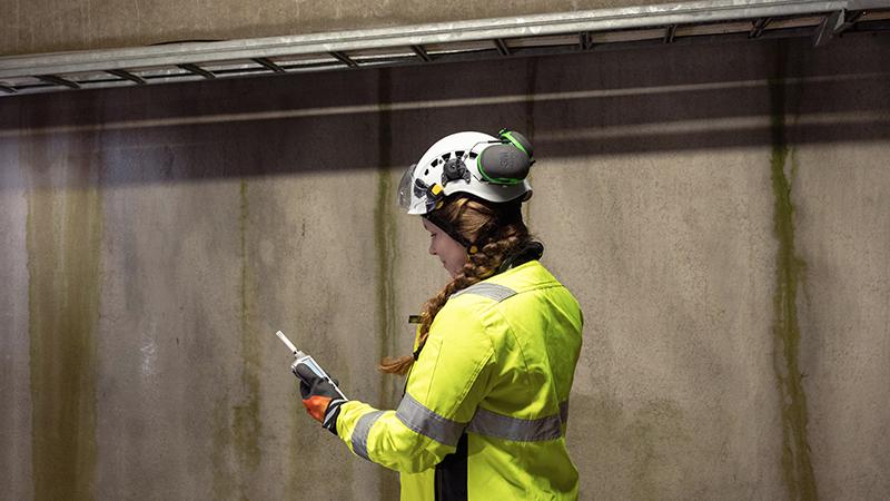 Construction worker holding HM40.