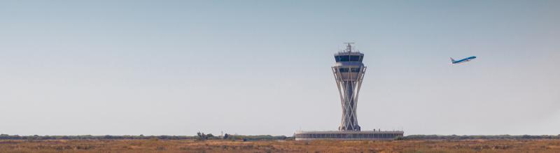 Plane taking off at El Prat airport in Barcelona, Spain